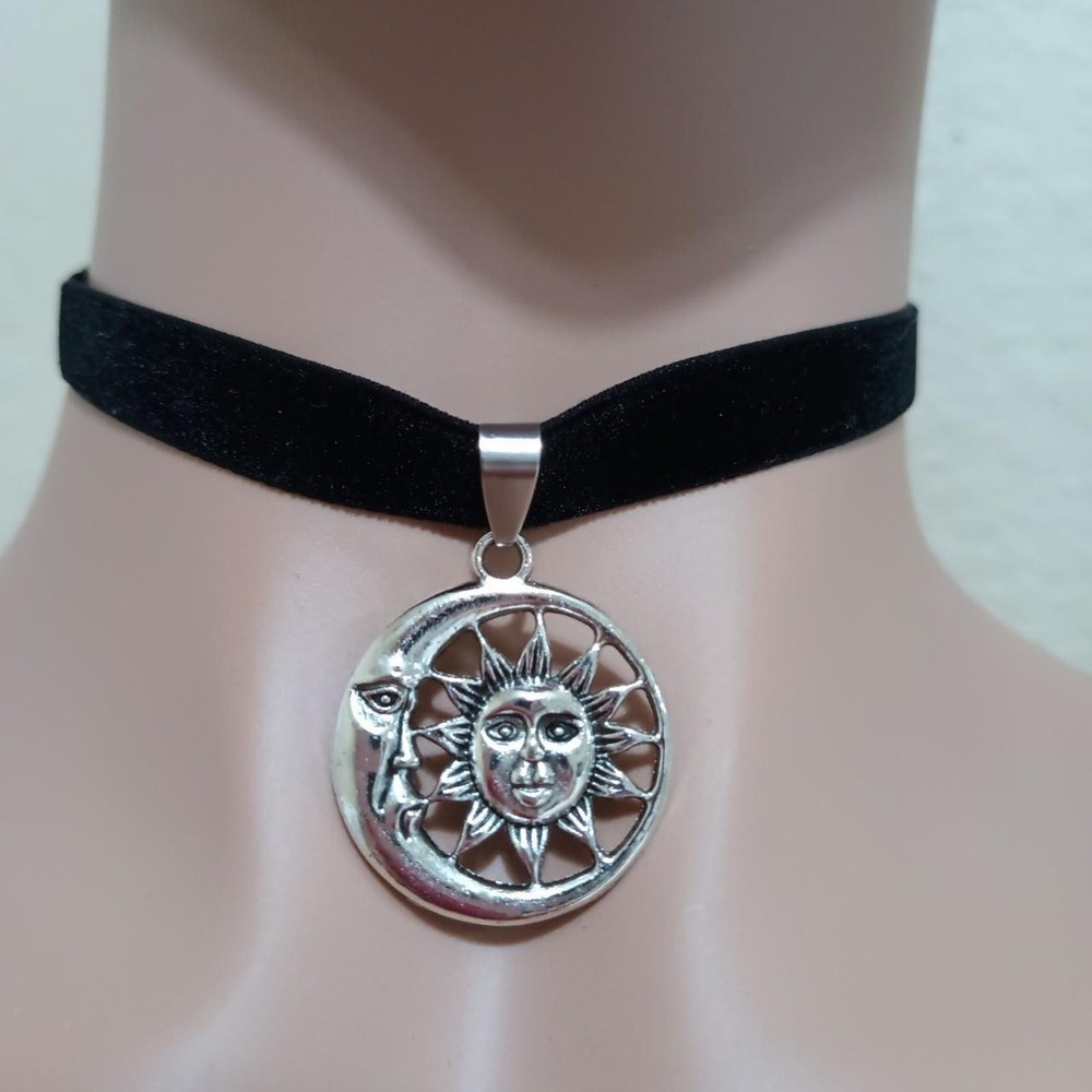 Silver tone crescent moon sun